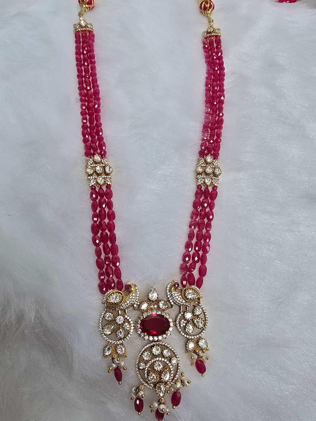 Peacock Ruby Haar