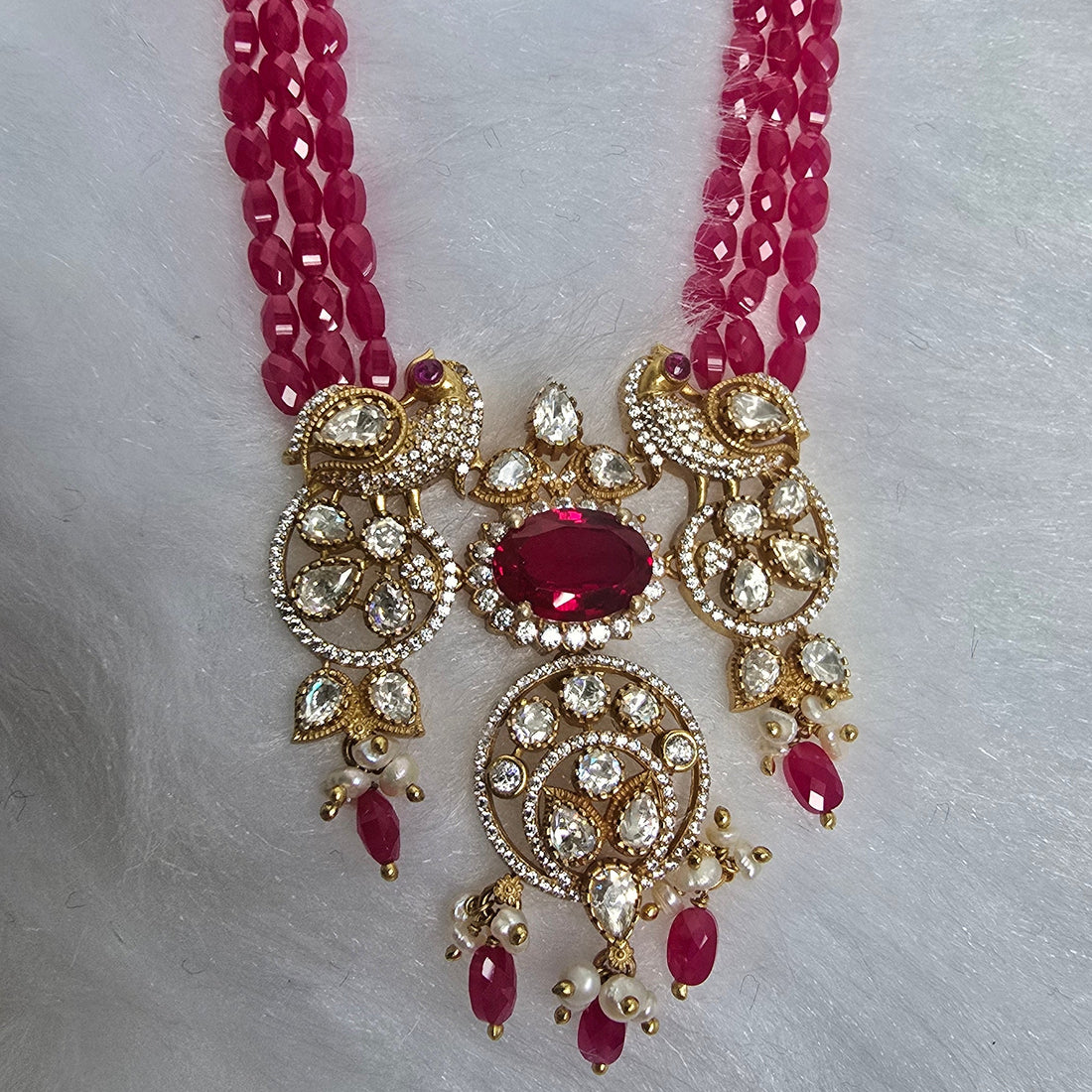 Peacock Ruby Haar