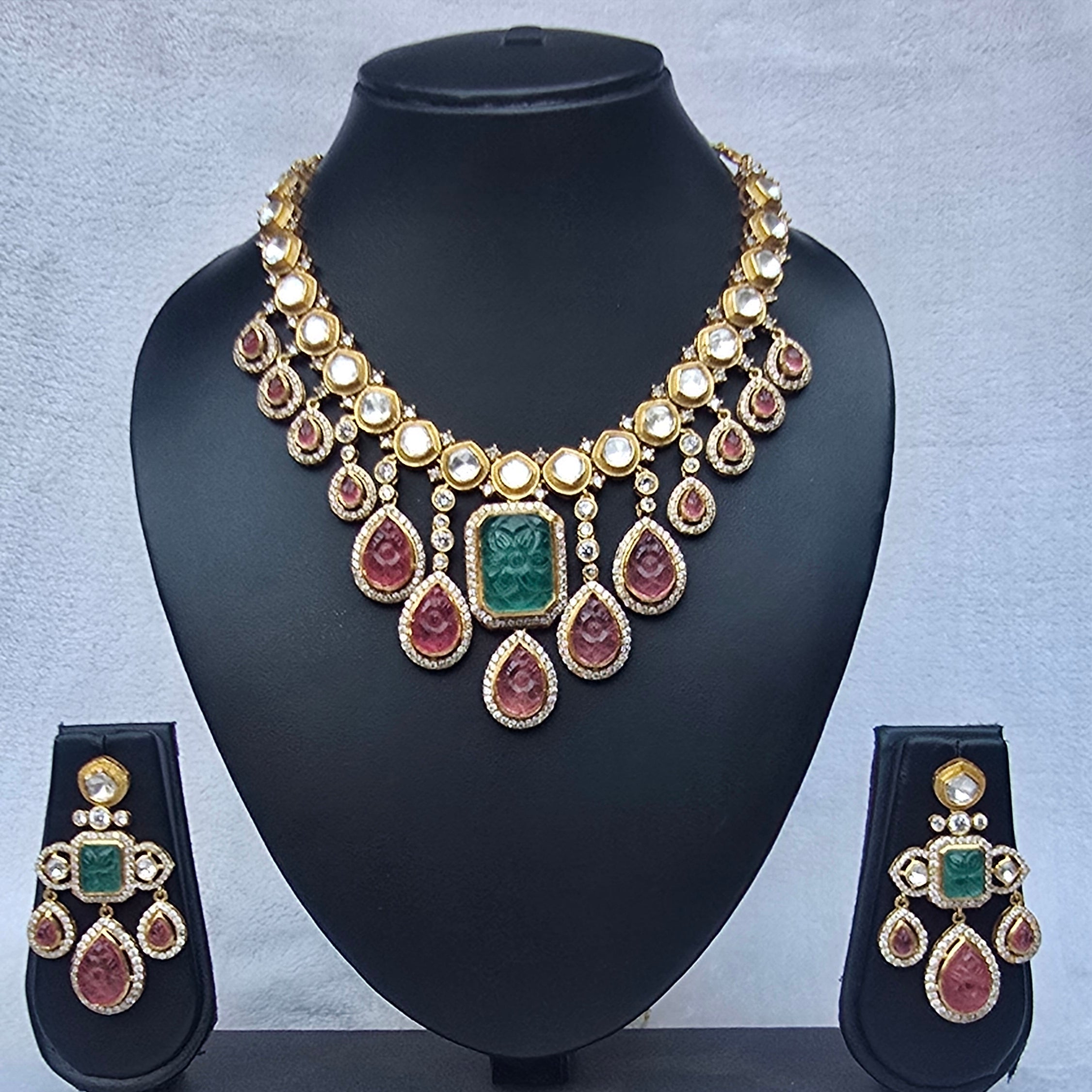 Polki Ruby Pink Tourmaline Necklace showcasing intricate design with Polki diamonds and vibrant rubies.