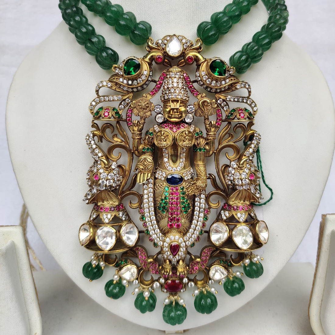Divine Lord Venkateswara pendant online showcasing intricate design and craftsmanship with vibrant colors.